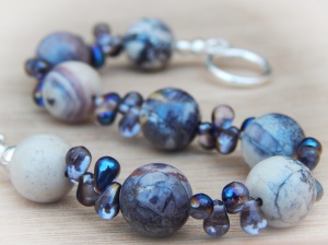 Terra Rosa Jasper with Czech glass teardrops, they really compliment each other.